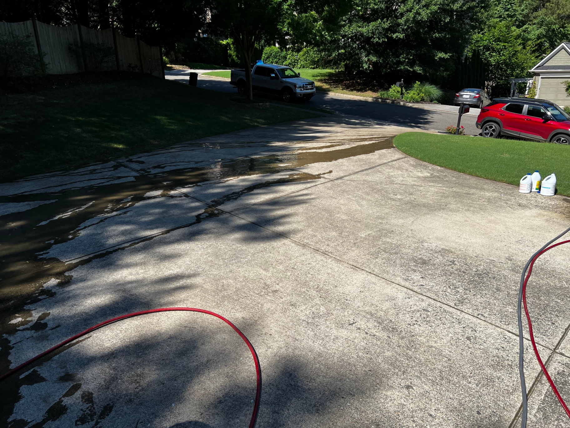 Stained concrete driveway in Canton, GA before pressure washing